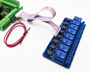 A relay board is shown connected to an older Acorn Rev3 board