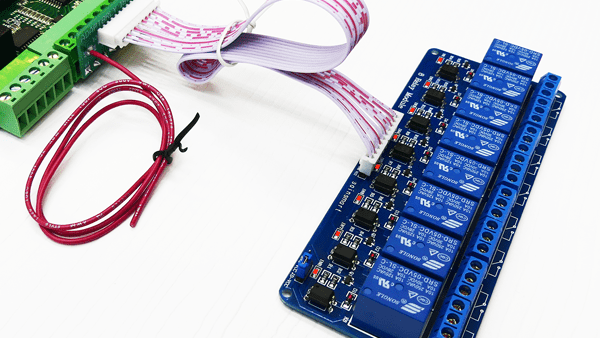 A relay board is shown connected to an older Acorn Rev3 board